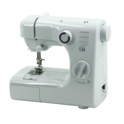 Tiendas de prendas de vestir DC 6V 1000mA Ojo de botón agujero de costura Maquinas de Coser Collaretera