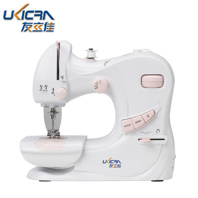 Mini máquina de coser para el hogar UFR-601 con longitud de punto de 0-5 mm en color blanco y rosa